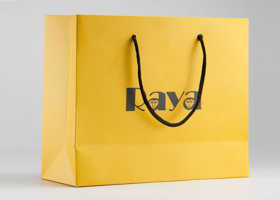 صفراء ماتي أكياس التسوق ورقة مقبض النايلون وشعار حسب الطلب المطبوعة